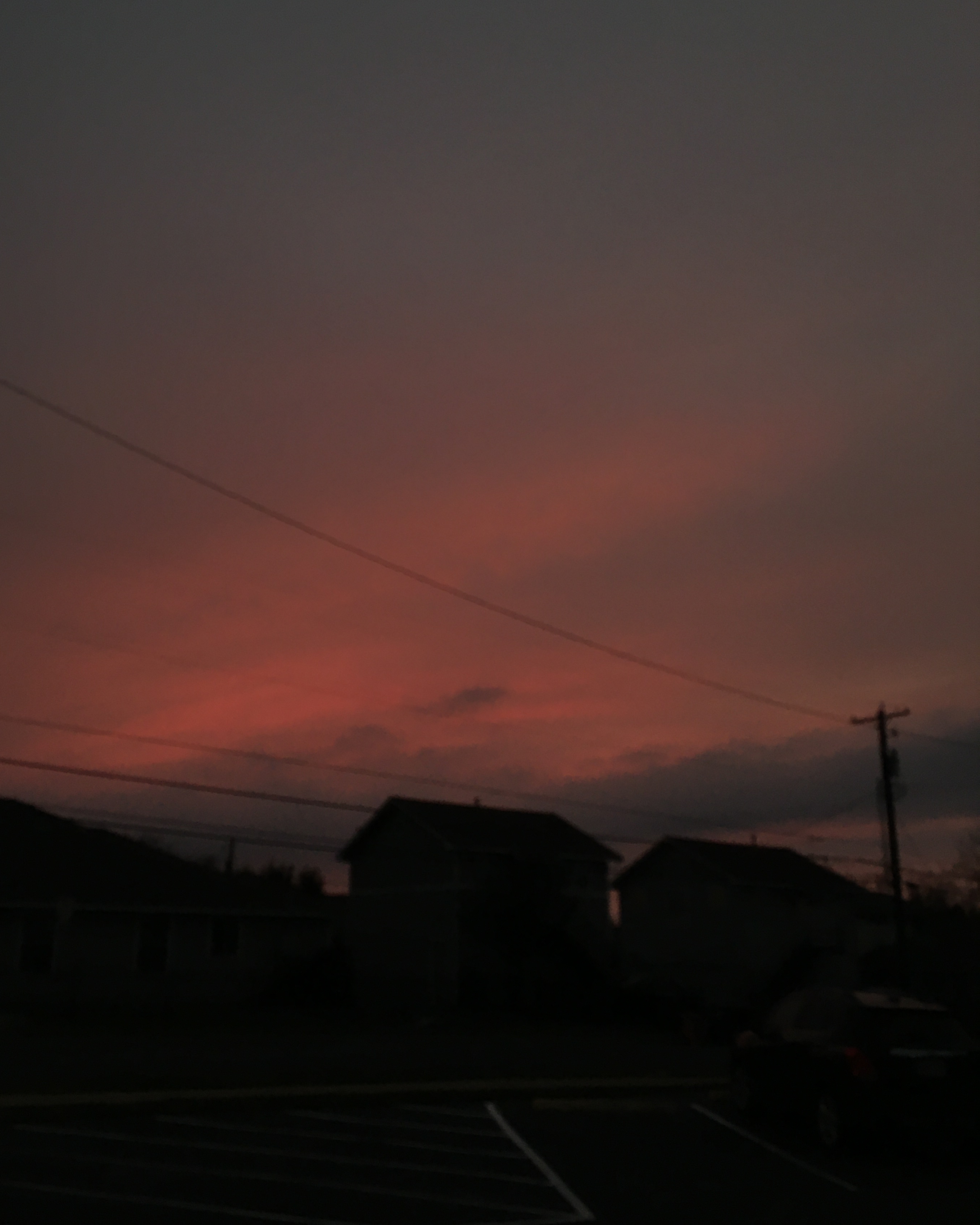 blurry, under-exposed photo of a violet sunset